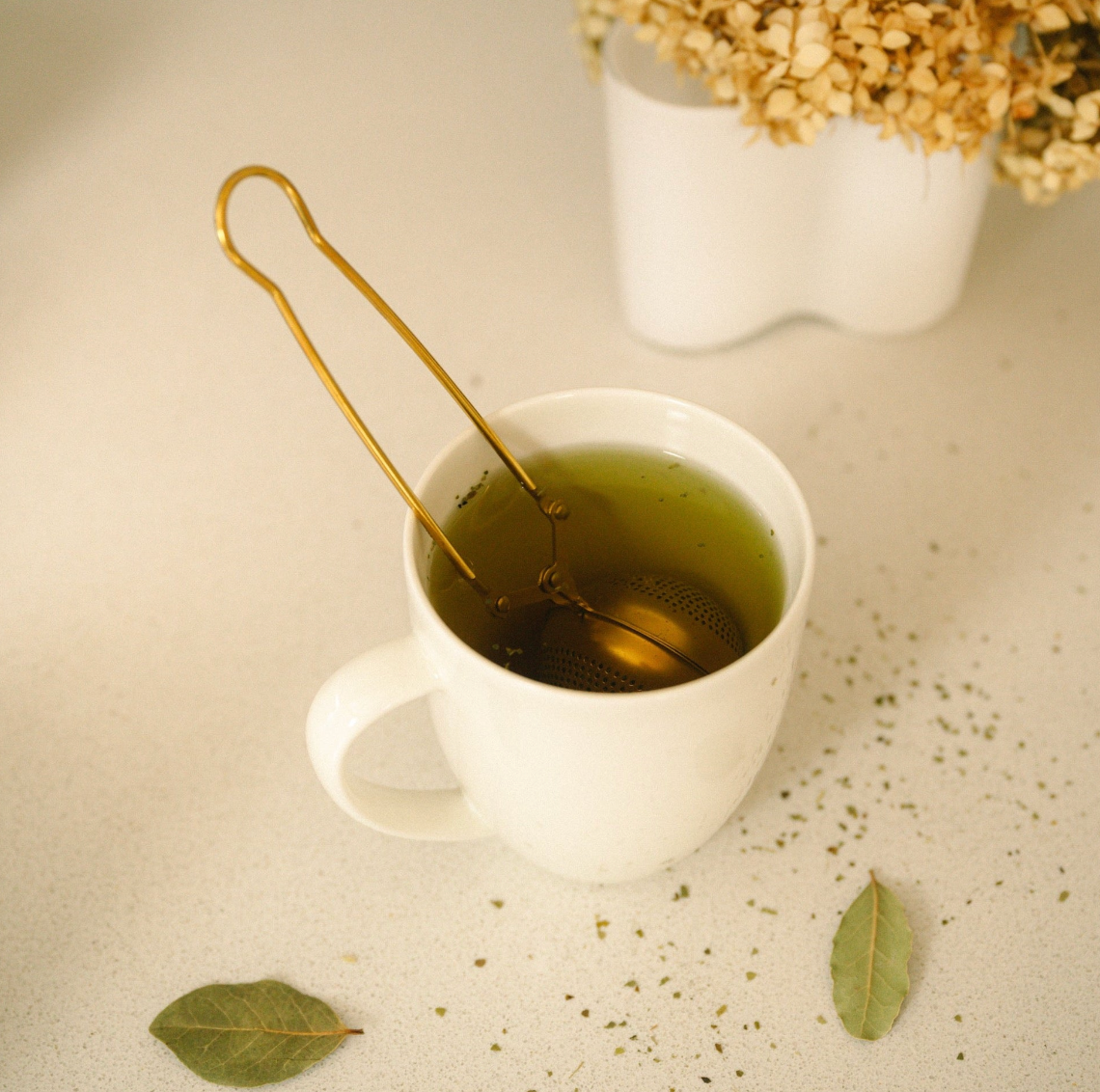 Colador de té de acero inoxidable dorado con infusor